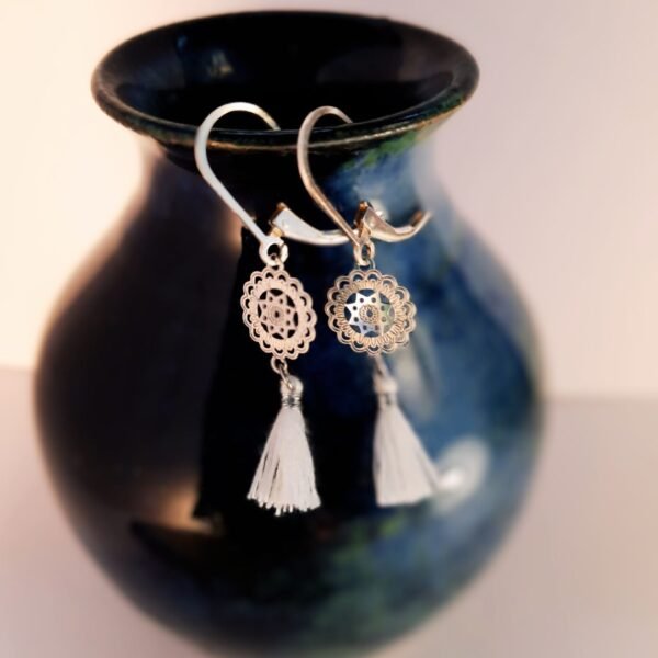 Silver tassle earrings in dreamy white