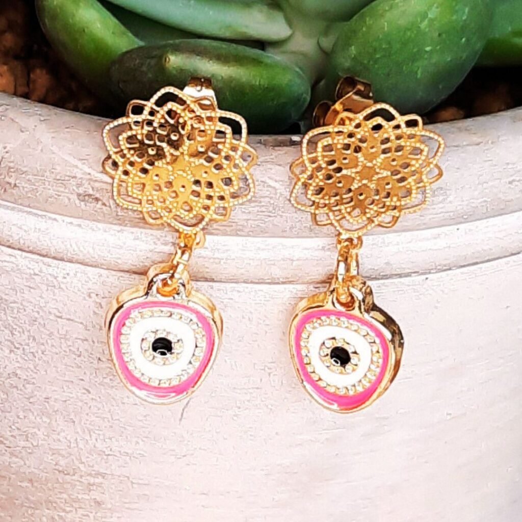 Wildflower evil eye earrings in coral