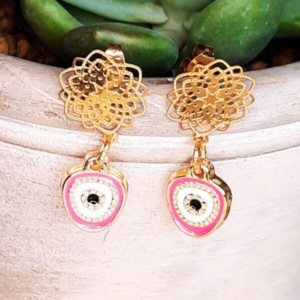 Wildflower evil eye earrings in coral